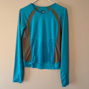 The North Face long sleeved blue and gray “tech”t shirt. Size S. Has thumb holes